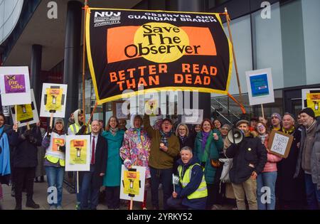 London, UK. 04th Dec, 2024. Artist Grayson Perry (centre-left) and Trades Union Congress (TUC) General Secretary Paul Nowak (centre-right) join the National Union of Journalists (NUJ) picket outside The Guardian offices in King's Cross as staff begin their strike over the potential sale of The Observer, the Sunday newspaper currently published by the Guardian Media Group, to Tortoise Media. Credit: SOPA Images Limited/Alamy Live News Stock Photo