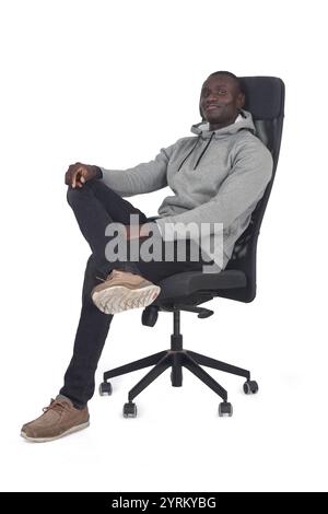 side view a man sitting on chair on white background Stock Photo