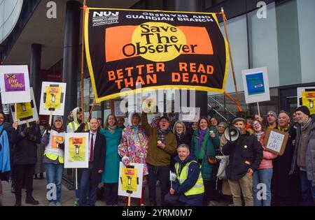 London, UK. 04th Dec, 2024. Artist Grayson Perry (centre-left) and Trades Union Congress (TUC) General Secretary Paul Nowak (centre-right) join the National Union of Journalists (NUJ) picket outside The Guardian offices in King's Cross as staff begin their strike over the potential sale of The Observer, the Sunday newspaper currently published by the Guardian Media Group, to Tortoise Media. (Photo by Vuk Valcic/SOPA Images/Sipa USA) Credit: Sipa USA/Alamy Live News Stock Photo