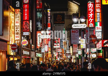 TOKYO, JAPAN - October, 22, 2024: Neon signs and billboards on the streets of Tokyo, Shibuya district Stock Photo