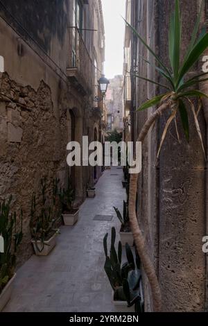 Narrow street in Ortigia, Sicily, Italy. Stock Photo