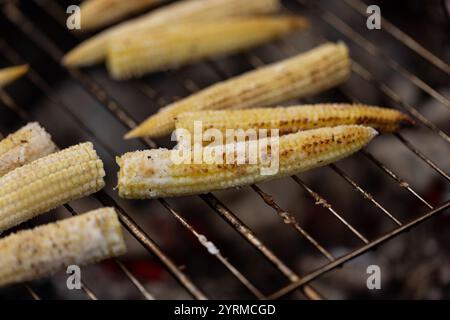 Baby corn on the grill Stock Photo