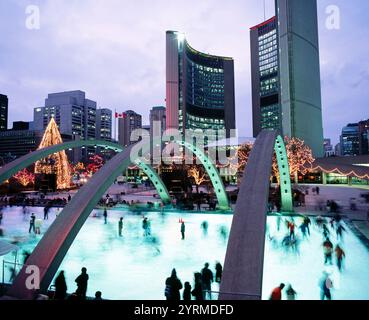 City Hall in front of ice rink at Nathan Phillips Square. Toronto. Canada Stock Photo