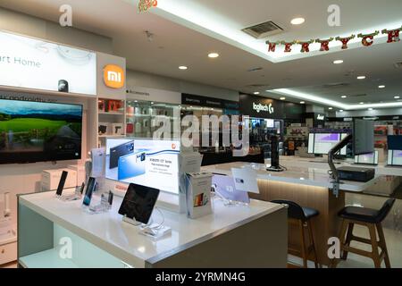 KUALA LUMPUR, MALAYSIA - DECEMBER 01, 2023: gadgets on display at All IT Hypermarket in Suria KLCC shopping mall. All IT Hypermarket offers a wide ran Stock Photo
