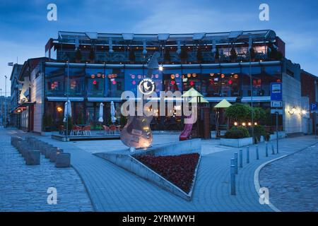 Latvia, Western Latvia, Kurzeme Region, Liepaja, center of Latvia's Rock Music scene, Latvia's First Rock Cafe, evening Stock Photo