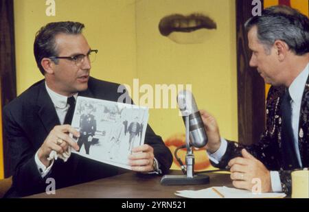 JFK  1991 Warner Bros. film with Kevin Costner at left  as Jim Garrison and John Larroquette as Jerry Johnson Stock Photo