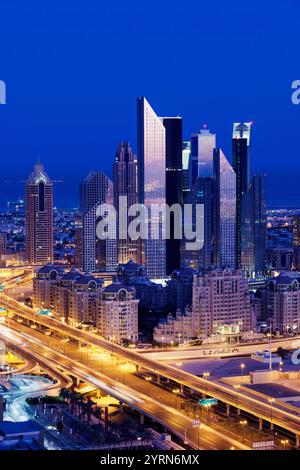 UAE, Dubai, Downtown Dubai, elevated view of skyscrapers on Sheikh Zayed Road from downtown, dawn. Stock Photo