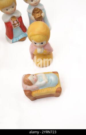 Nativity Figures Christmas Decorations Virgin Mary and the Baby Jesus Christ in a Crib Stock Photo