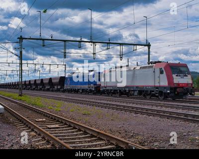 Kiruna, Sweden - 23 Jun 2024: An iron ore freight train at Kiruna, Sweden. Stock Photo