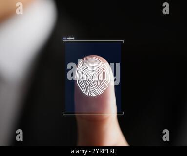 Man pressing finger to surface showing friction ridges pattern, closeup. Scanning fingerprint Stock Photo