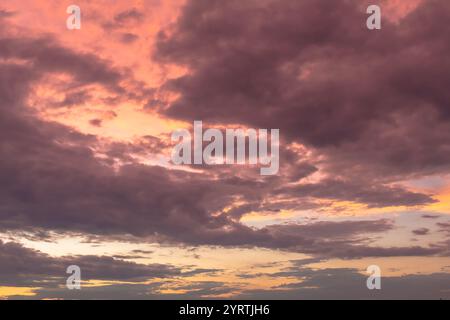 Pink and orange dramatic and colorful sunset. Photo was taken of the sky at golden hour after a rainstorm. Photo was taken in San Antonio Texas. Stock Photo