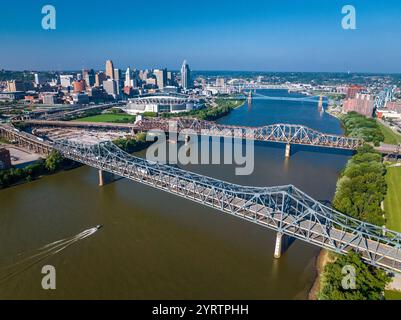 aerial view of Suspension Bridges and James Roebling Bridge crossing Ohio River from Covington Kentucky to Cincinnati Ohio Stock Photo