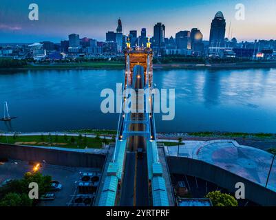 aerial view of Suspension Bridges and James Roebling Bridge crossing Ohio River from Covington Kentucky to Cincinnati Ohio Stock Photo