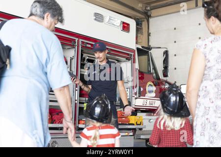 Children visit the NSA Souda Bay Firehouse (8611816). Stock Photo