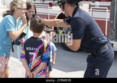 Children visit the NSA Souda Bay Firehouse (8611813). Stock Photo