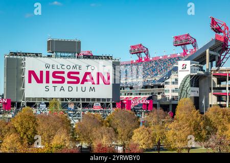 Nashville Nissan sports football stadium surrounded by fall foliage trees. Home to the NFL Tennessee Titans Stock Photo