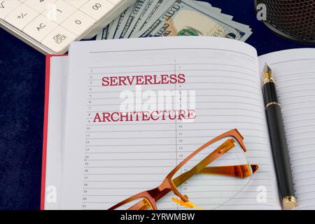 Concept words SERVERLESS ARCHITECTURE written in a business notebook, a conceptual photo. Stock Photo
