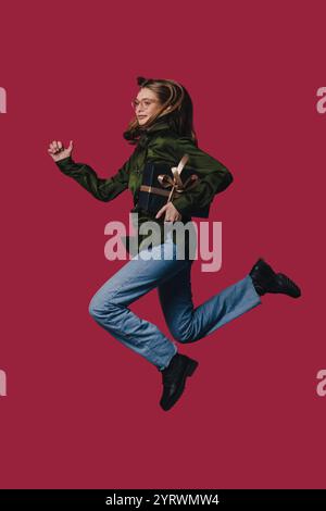 A Dynamic Fashion Shot Featuring a Young Woman in Motion Capturing Energy and Style Stock Photo