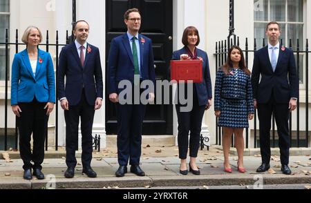 British treasury ministers leave 11 Downing Street to present the Budget to Parliament. 30th October 2024. Left to right: Emma Reynolds, Parliamentary Secretary to the Treasury; James Murray, Exchequer Secretary to the Treasury; Darren Jones, Chief Secretary to the Treasury; Rachel Reeves, Chancellor of the Exchequer; Tulip Siddiq, Economic Secretary to the Treasury and Lord Livermore, Financial Secretary to the Treasury. Stock Photo