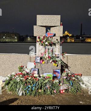 spontaneous memorial to Alexei Navalny at the monument to victims of political repression in St. Petersburg on February 16, 2024. Alexei Navalny (1976 � 16 February 2024) was a Russian opposition leader, anti-corruption activist and political prisoner. Navalny and his team published material about corruption in Russia, organised political demonstrations and promoted his campaigns. In January 2021, Navalny returned to Russia. In March 2022, Navalny was sentenced to an additional nine years in prison. In December 2023, Navalny went missing from prison for almost three weeks. He re-emerged in an Stock Photo