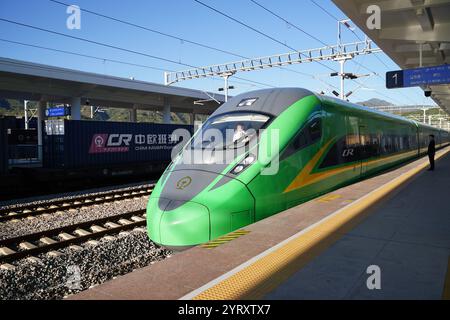 The China-Laos Railway passenger train departs from Kunming and travels to Mohan, Yuxi, Yunnan, on December 1. Pu'er,China.3rd December 2024. December 3, 2024, marks the third anniversary of the opening of the China-Laos Railway. This railway starts from Kunming, China, in the north and ends in Vientiane, Laos, in the south, with a total length of 1,035 kilometers. In the past three years, the China-Laos Railway has carried more than 43 million passengers and transported 48.3 million tons of cargo. It has made important contributions to promoting regional connectivity and economic development Stock Photo