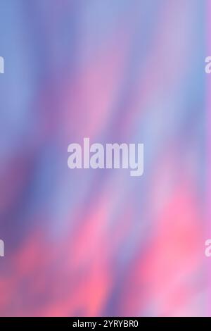 Calm pink-blue gradient background with spots smoothly flowing to each other. Stock Photo