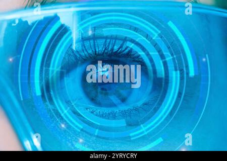 Close-up of an eye scanning a futuristic digital interface with augmented reality Stock Photo