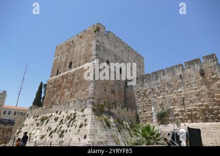 Young Arab boy at prayer in the Muslim Quarter (Harat al-Muslimin), Old city of Jerusalem. It is the largest and most populous of the four quarters and is situated in the north-eastern corner of the Old City Stock Photo