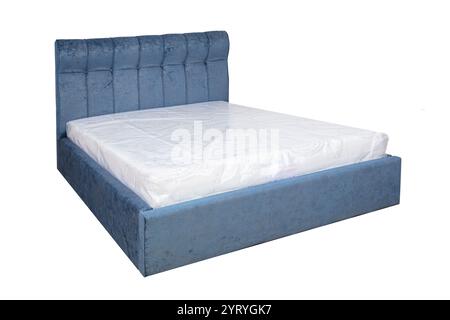 Double bed with soft headboard. Cushioned furniture. Stock Photo
