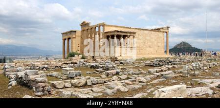 The Erechtheion  or Temple of Athena Polias is an ancient Greek Ionic temple on the north side of the Acropolis, Athens, which was primarily dedicated to the goddess Athena. 5th century BC Stock Photo