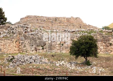 Bronze Age citadel of Mycenae in southern Greece. Mycenae was built with an enclosed acropolis within fortified walls. The fortification was extended during the 13th century BC. represents one of the significant characteristics of the early phase of the Mycenaean civilization. Stock Photo