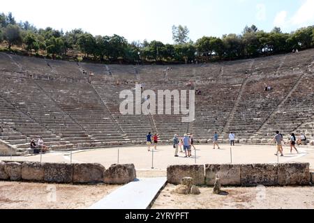 The Ancient Theatre of Epidaurus is a theatre in the Greek city of Epidaurus, located on the southeast end of the sanctuary dedicated to the ancient Greek God of medicine, Asclepius. It is built on the west side of Cynortion Mountain, near modern Lygourio, and belongs to the Epidaurus Municipality. Constructed in late 4th century BC Stock Photo