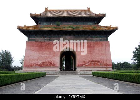 The Wanli Emperor of China, died in 1620 and was buried in Red lacquer coffins at the Dingling Mausoleum among the Ming tombs on the outskirts of Beijing. The back chamber and main hall of the underground palace held the coffins of the Wanli emperor and empresses Xiaodian and Xiaojing, (empresses Wang). Placed around the three coffins were another twenty six red lacquered chests of nanmu wood filled with sacrificial objects and jade pieces. Stock Photo