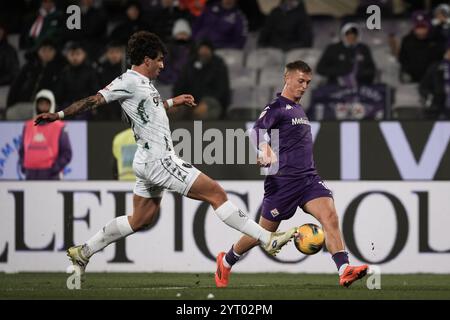 Firenze, Italia. 05th Dec, 2024. FiorentinaÕs Albert Gudmundsson fights for the ball with Empoli's Luca Marianucci during the Round of 16 Frecciarossa Italian Cup 2024/2025 match between Fiorentina and Empoli at Artemio Franchi stadium - Sport, Soccer - Florence, Italy - Wednesday December 4, 2024 (Photo by Massimo Paolone/LaPresse) Credit: LaPresse/Alamy Live News Stock Photo