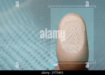 Woman pressing finger to surface showing friction ridges pattern, closeup. Scanning fingerprint Stock Photo
