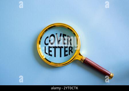 Cover Letter symbol. Concept word Cover Letter with Magnifying glass. Beautiful blue background. Business and Cover Letter concept. Copy space Stock Photo