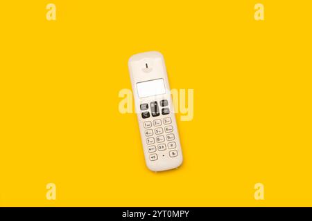 A white cordless phone on a white background with copy space Stock Photo