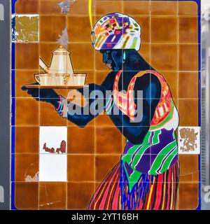 Traditional Spanish, glazed ceramic tiles, close up. Decorative painted tiles. Colorful Azulejos. Ornate pattern, for design, backdrop. Merida, Spain. Stock Photo