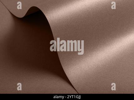 Trendy textured paper background in mocha mousse color. Stock Photo