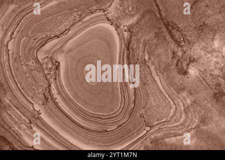 Abstract background of brown tiles with a stone pattern. Demonstrating the colors of 2025 - Mocha Mousse. Color concept. Stock Photo