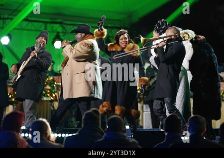 Virginia. 5th Dec, 2024. The War and Treaty, the husband-and-wife duo Michael Trotter Jr. and Tanya Trotter, are joined by Trombone Shorty as they perform at the 102nd National Christmas Tree Lighting Ceremony on the Ellipse at The White House and President's Park in Washington, DC on Thursday, December 5, 2024. This year's tree is a 35-foot Red Spruce from the George Washington and Jefferson National Forests in Virginia. Credit: Bonnie Cash/Pool via CNP/dpa/Alamy Live News Stock Photo