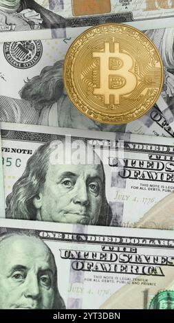 Bitcoin illustration on 100 dollar bills Stock Photo