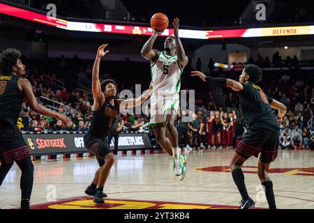 Oregon guard TJ Bamba (5) shoots against Liberty during the first half ...