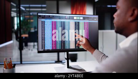 Business Data Audit Spreadsheet On Analyst Computer Stock Photo