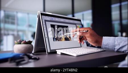 Office Designer At Work: Graphic Artist On Computer Stock Photo