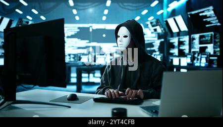 Hacker Stealing Data From Computer. Piracy And Fraud Stock Photo
