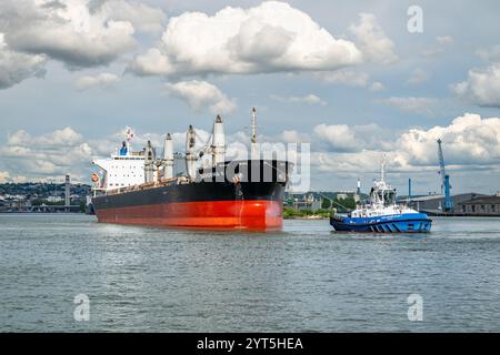 Banks of the River Seine, river port, Seine Axis Major River-Sea Port, HAROPA Port in Rouen (northern France): arrival of the bulk cargo ship Gardenia Stock Photo