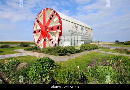 Tunnel boring machine (TBM) T4 Virginie used in the construction of the EuroTunnel, on display at a roundabout in tribute to the builders of the Chann Stock Photo