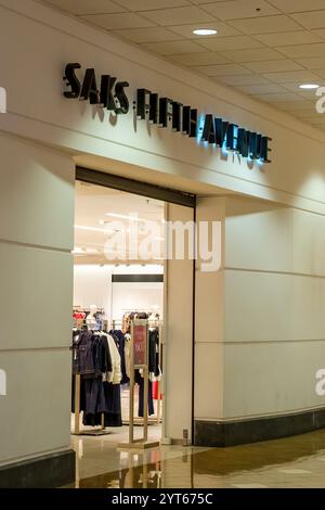 New Orleans, LA, USA - June 23, 2024: Entrance to Saks Fifth Avenue store inside One Canal Place Shopping Center Stock Photo