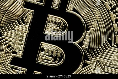 Stunning image of a golden bitcoin. Capturing the intricate details of the iconic  physical representation of the digital value cryptocurrency Stock Photo
